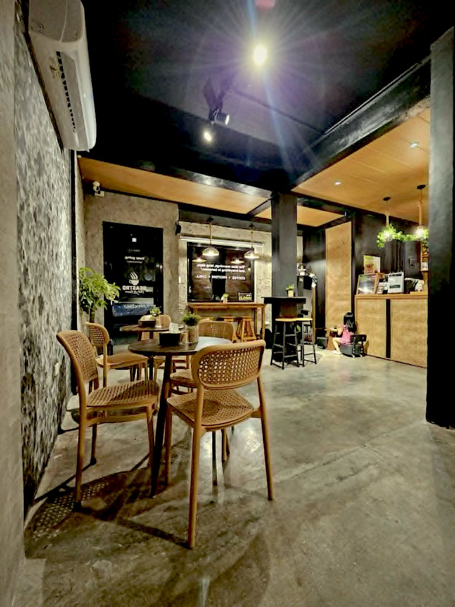 Inside Beastro: brick counter, cane chairs and the lounge