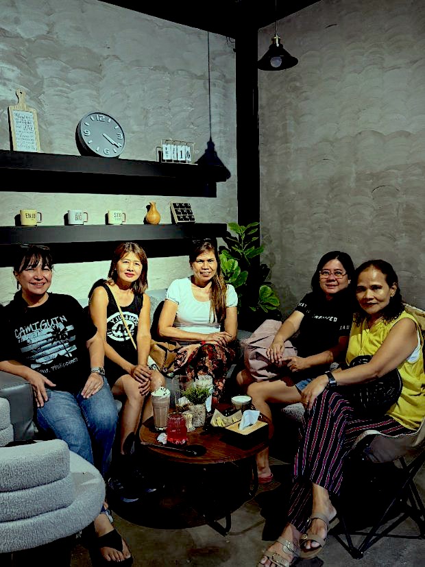 Family and friends settled into the sofa corner